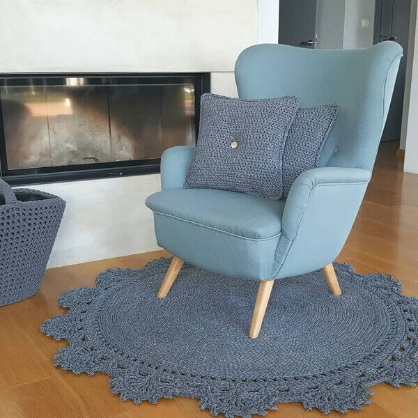 Round crochet rug in living room