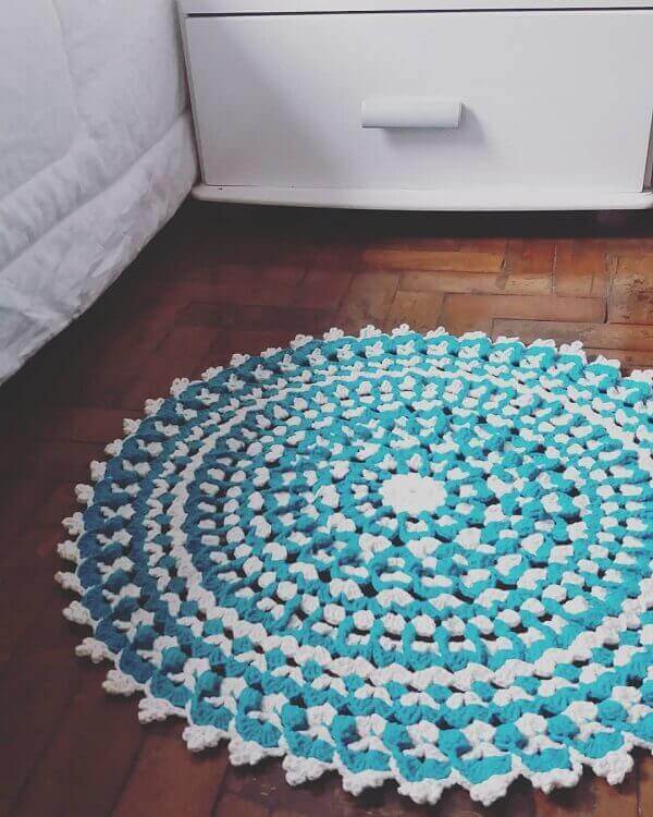 Round crochet rug in bedroom