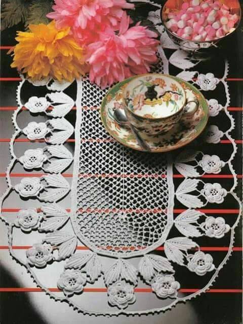 crochet table runner with white flowers