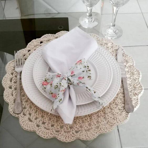 crochet sousplat with flowered napkin