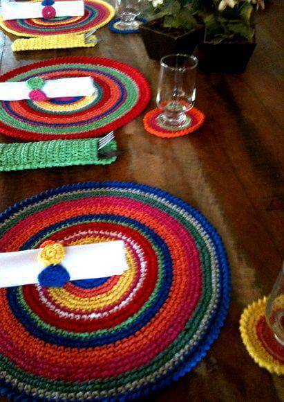 colorful crochet sousplat on wooden table