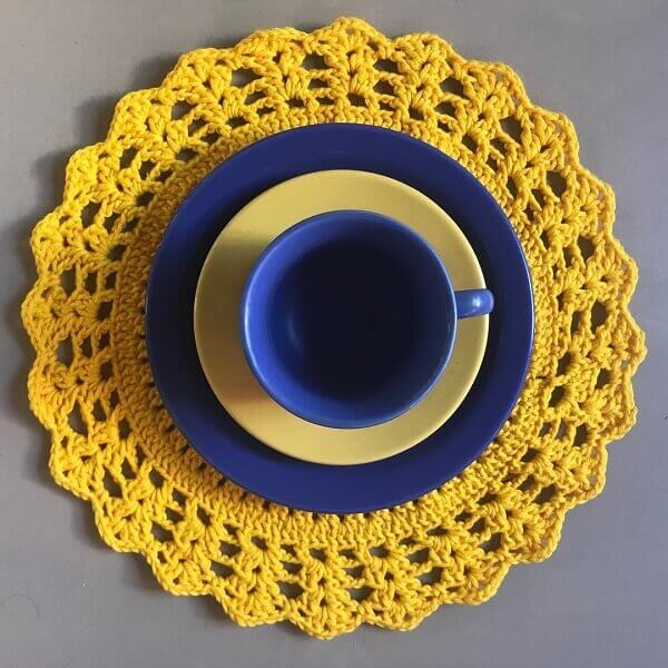 Yellow crochet sousplat
