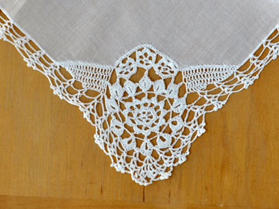 Delicate fabric with detailed crochet nozzle Photo by Bumblebee Linens