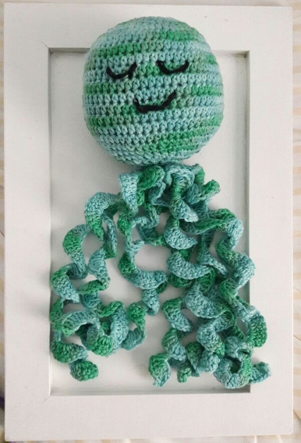 Crochet octopus with different shades of green