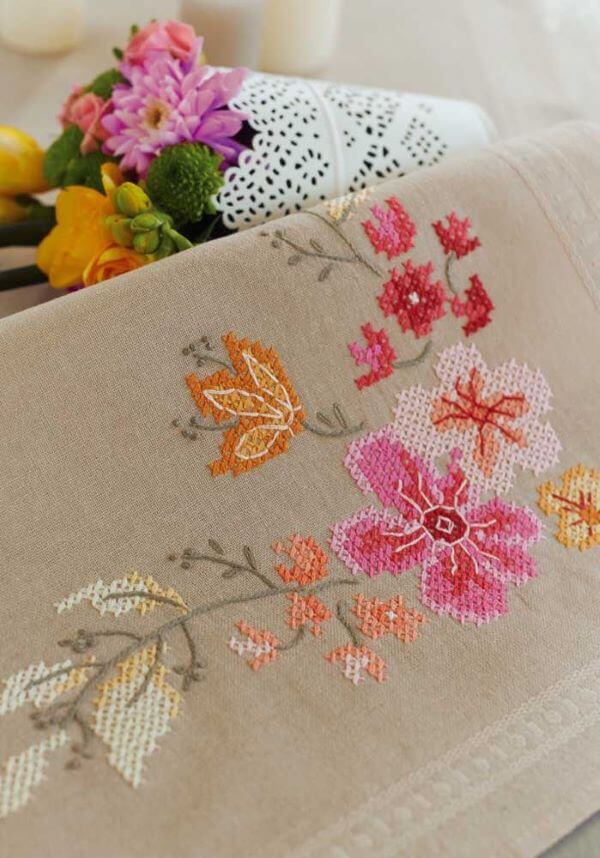 Tablecloth with delicate embroidered flowers