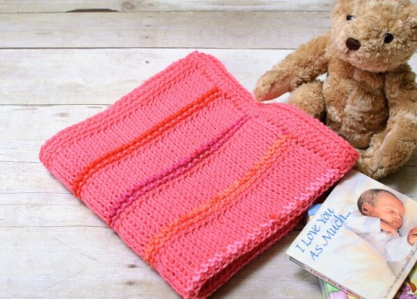 Baby pink blanket made in different types of Tunisian crochet stitches