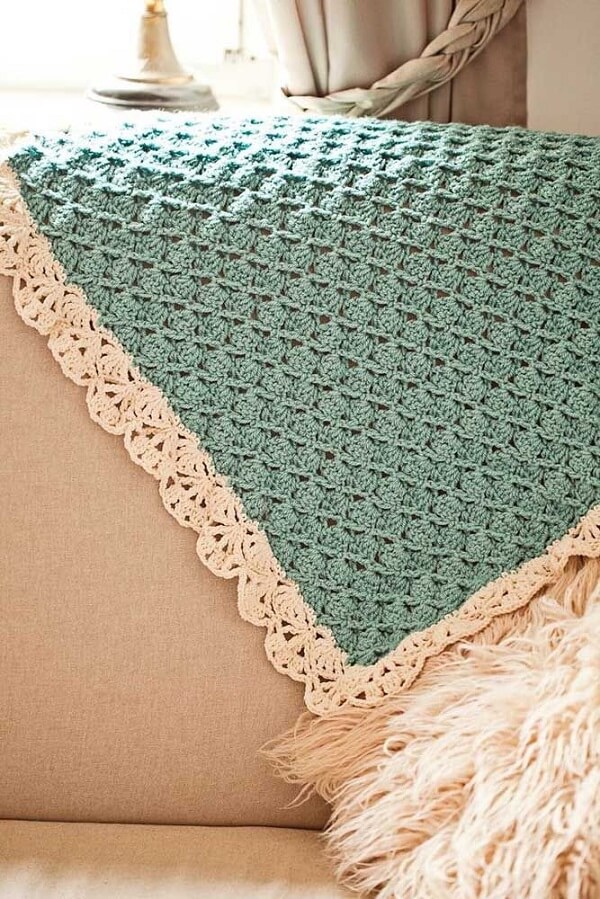 Turquoise blue blanket made in Tunisian crochet