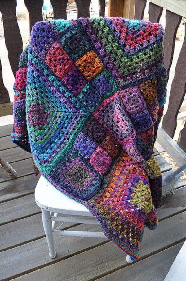 Colorful blanket model made in Tunisian crochet