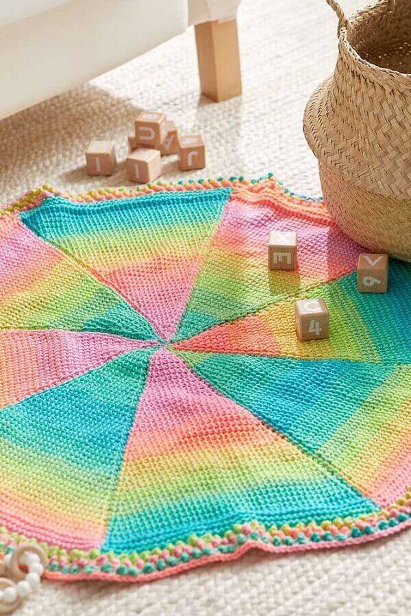 Colorful rug made in Tunisian crochet