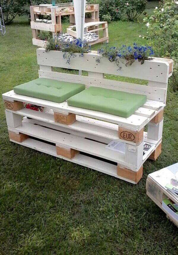 The structure of the pallet bench accommodates a planter in the back