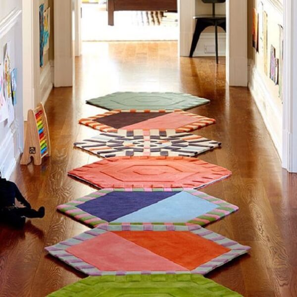 The corridor is very charming with the presence of the colorful patchwork rug