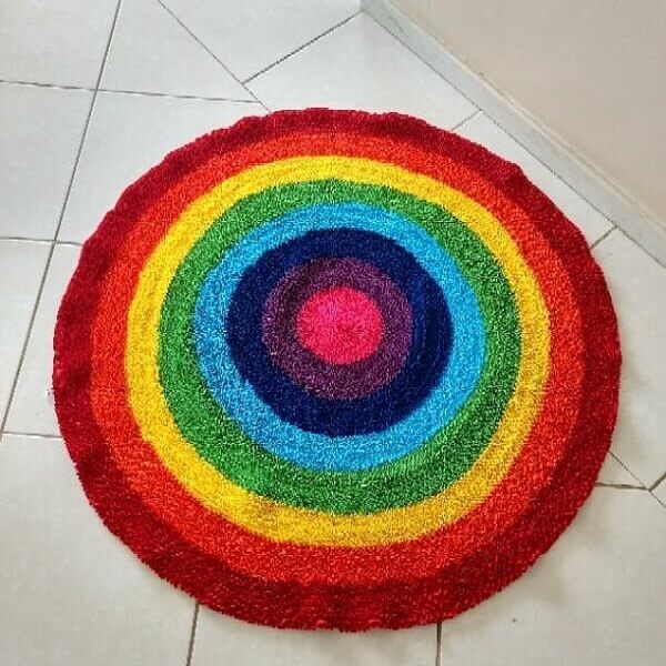 Fabrics that would be discarded form a beautiful patchwork rug