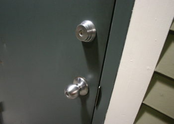 How do you remove a deadbolt with a key on both sides?