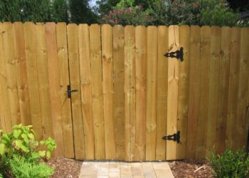 pavers under fence gate