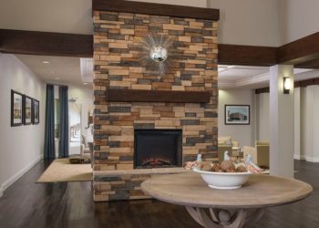 Can I cover a brick fireplace with drywall?
