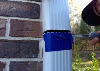 how to cut gutter downspout hole