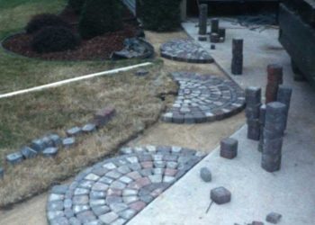 How do you widen a paver driveway?