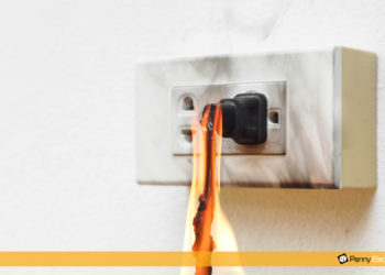 What causes a burnt plug socket?