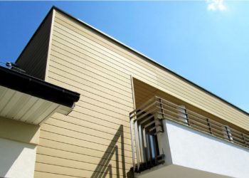 How do you cover plastic wall panels?
