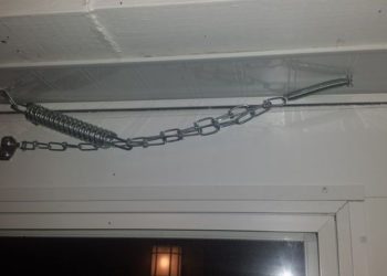 How do you put a safety chain on a storm door?