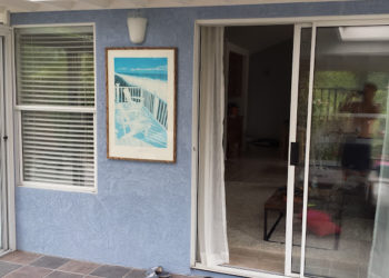 wood paneling over stucco