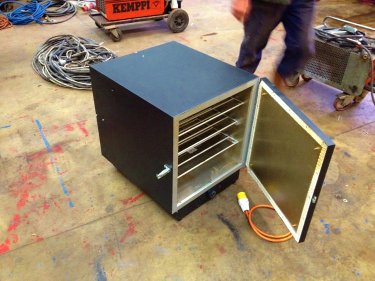 What temperature is a welding rod oven?