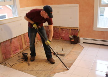 What is the easiest way to remove vinyl floor tiles?