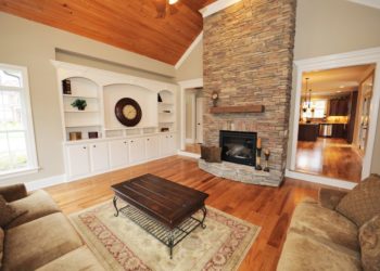 Can you put stone veneer over brick fireplace?