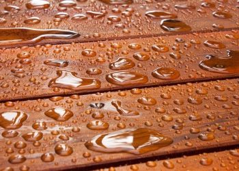 How do you protect wood from bathroom water?