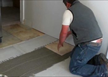How do you lay ceramic tile on a concrete floor?