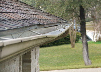 What is the minimum slope for gutters?