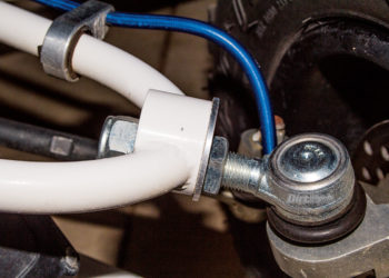 How do you adjust camber and caster?