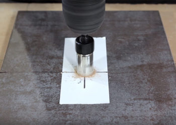 how to drill holes in tiles for pipes