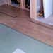 Where do u start when laying laminate flooring?
