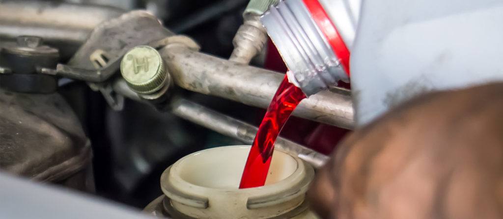 best way to get transmission fluid off concrete