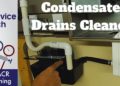 How do you clean the condensate trap on a carrier furnace?