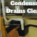 How do you clean the condensate trap on a carrier furnace?