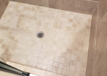 grout stays wet after shower