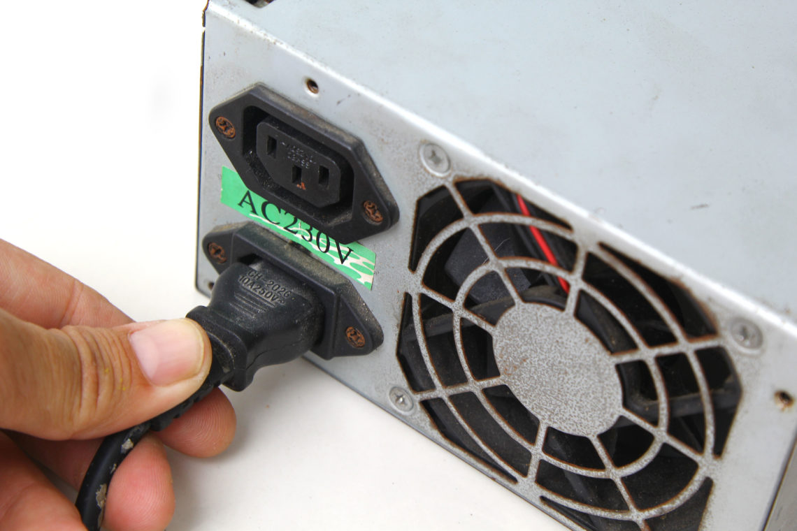 How can I use my laptop charger to power my car?