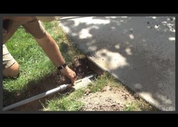 How do you get a 4 pipe under a driveway?