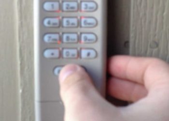 How do you remove an overhead door keypad?