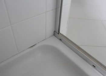 how to clean silicone caulk in shower