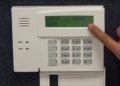 How do I reprogram my Honeywell alarm keypad?