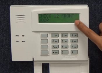 How do I reprogram my Honeywell alarm keypad?