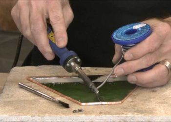 How do you fix a stained glass lamp shade?