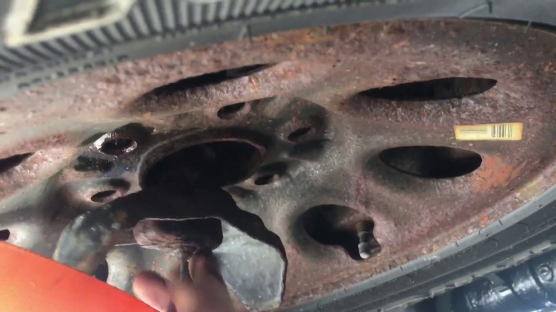 How do I get my spare tire off?