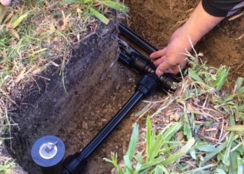 How do you install pop up sprinklers?