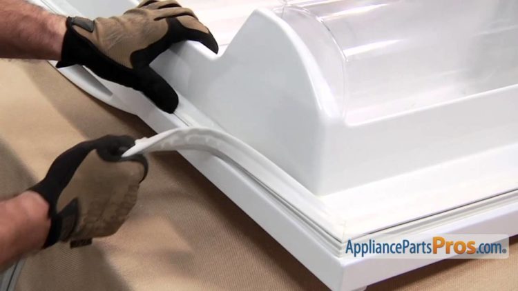 How do you replace a refrigerator door gasket on a Whirlpool refrigerator?