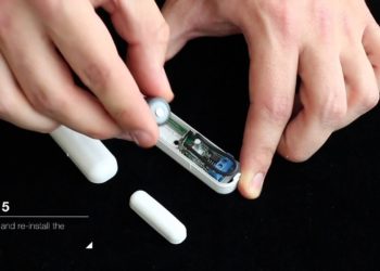 How do you reset a door sensor?