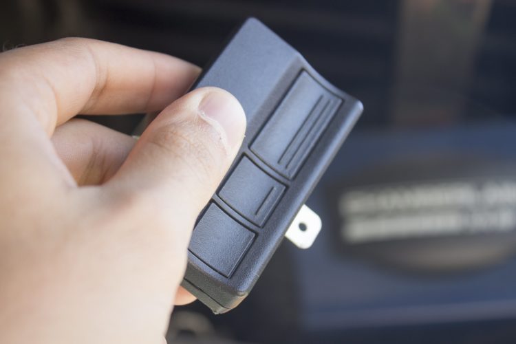 how to change garage door opener code